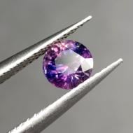 0.87Ct Натуральний фіолетовий поліхромний сапфір круг 5.5мм (Відео)