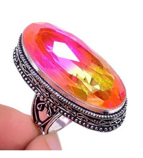 серебряное кольцо с двухцветным камнем