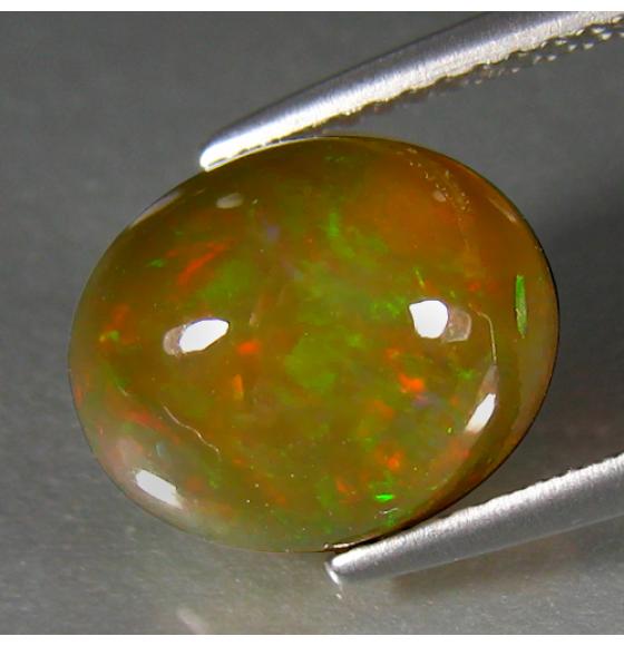 0.65CT ЭФИОПСКИЙ ОПАЛ МУЛЬТИКОЛОР (КАБОШОН) - Высокое качество. Доставка по Украине.