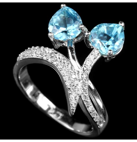 СЕРЕБРЯНОЕ КОЛЬЦО “ДВА СЕРДЦА” С ТОПАЗОМ 16.5Р