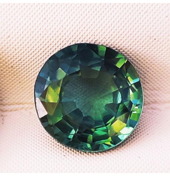 0.45Ct Необыкновенный полихромный сапфир 4.62мм круг (Видео) - Высокое качество. Доставка по Украине.
