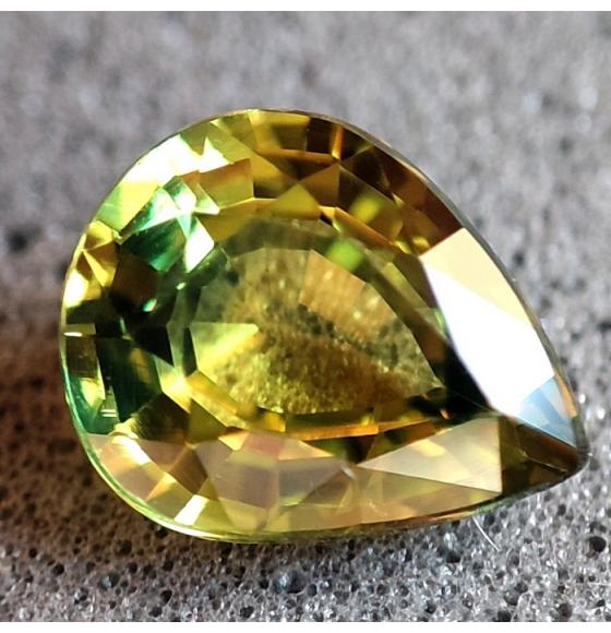 0.68Ct Не гретый полихромный сапфир 6*4.8мм груша (Сертификат) - Высокое качество. Доставка по Украине.